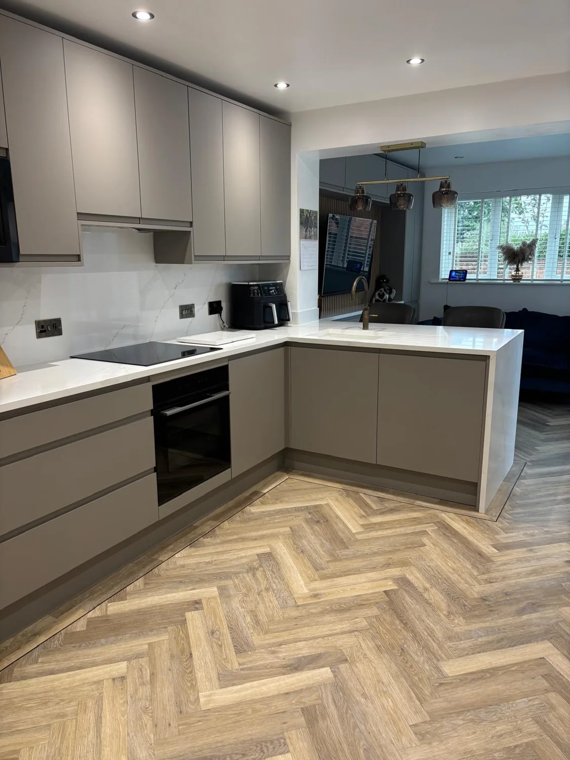 Finished fitted kitchen showing worktops and joinery details