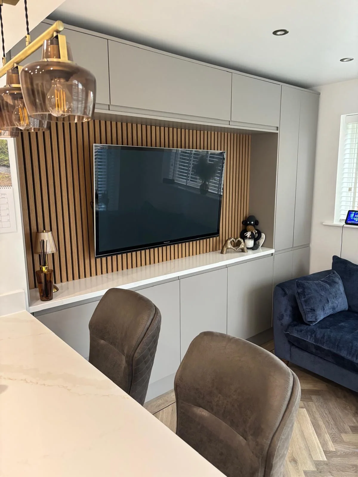 Finished media wall from kitchen area